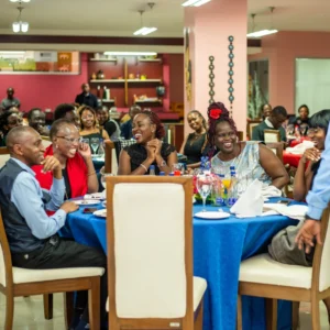 People seated at dining tables.